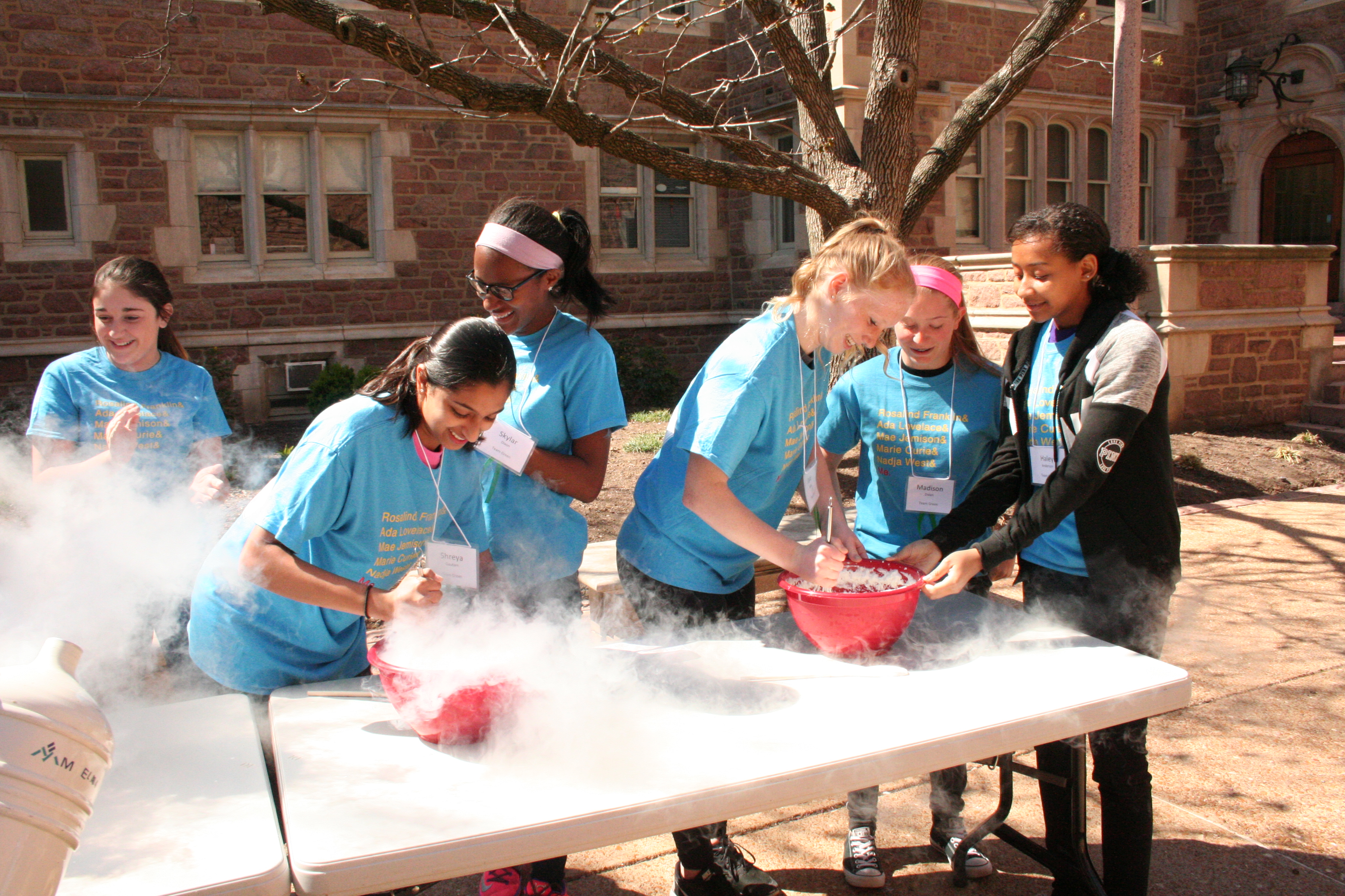 Catalysts high-school students making liquid-nitrogen icecream