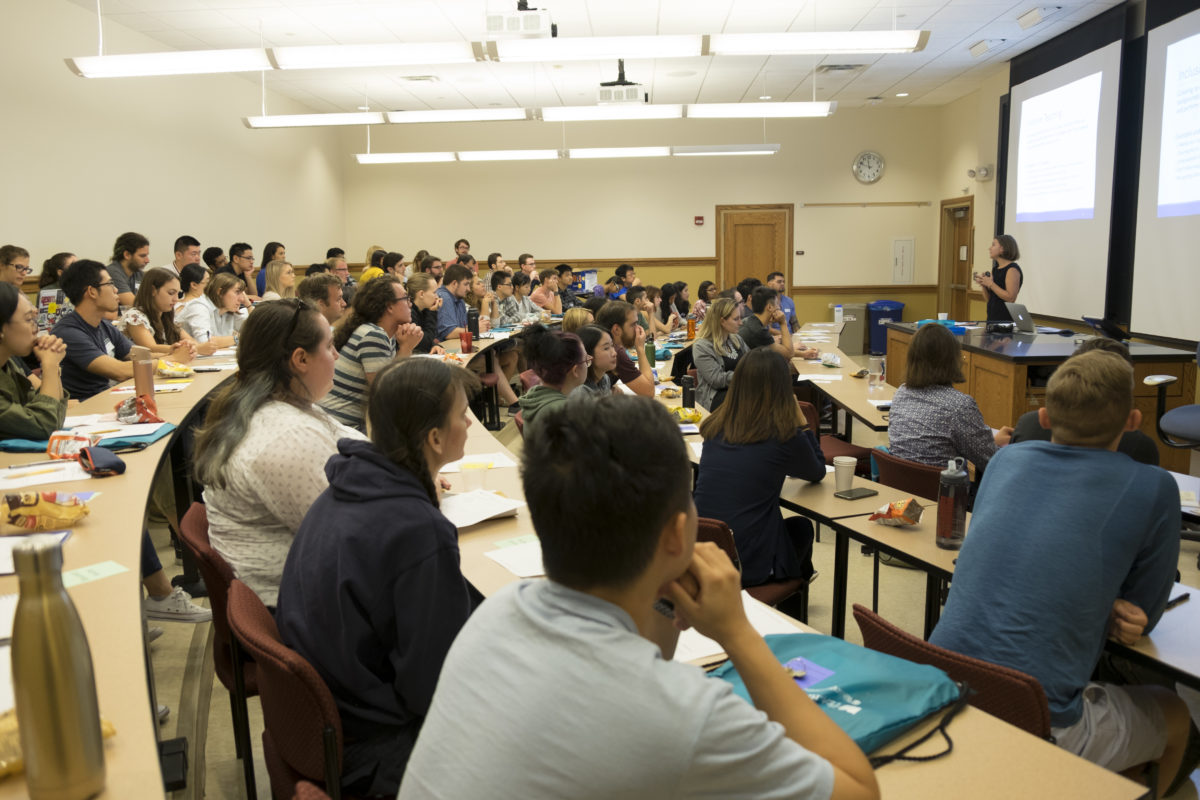 Julia Johnson, CTL staff, speaks in front of a classroom full of grad students during orientation 2018.