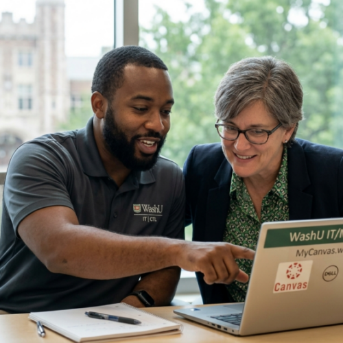 A man and a woman working together on a laptop